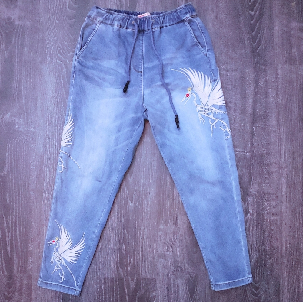 Donoratico winged dino skeleton jeans
